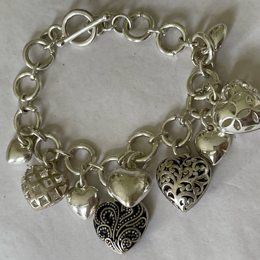 3/$20 SALE Loaded silver tone heart charm bracelet